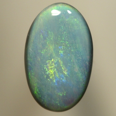 SOLID SEMI BLACK OPAL Even play of colour, orange and green over blue